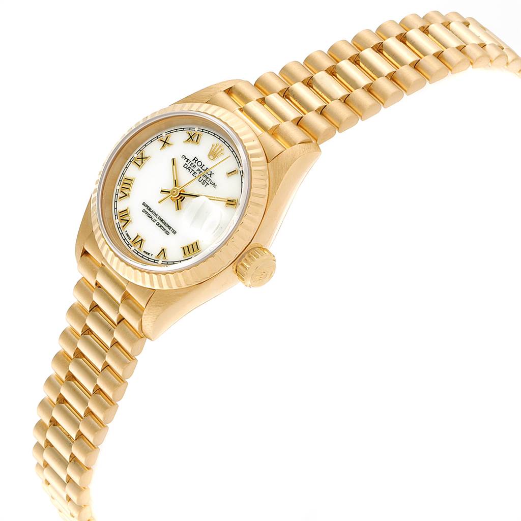 The Rolex President 69178 Women
s Yellow Gold White Dial 69178 Women
s Yellow Gold White Dial watch is shown from an angled side view, displaying the dial, crown, and gold bracelet.