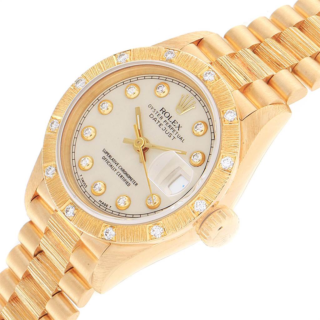 The image shows a close-up of the dial, bezel, and part of the bracelet of a Rolex President 69288 Women's Yellow Gold Beige Dial 69288 Women's Yellow Gold Beige Dial model watch.