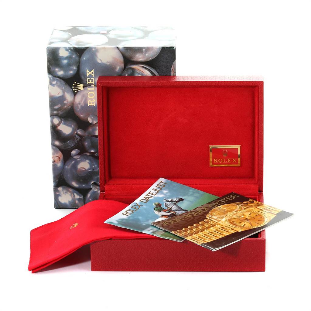 This image shows the box and accessories, including booklets, for a Rolex President 69088 Women's Yellow Gold Mother of Pearl Dial 69088 Women's Yellow Gold Mother of Pearl Dial model watch.