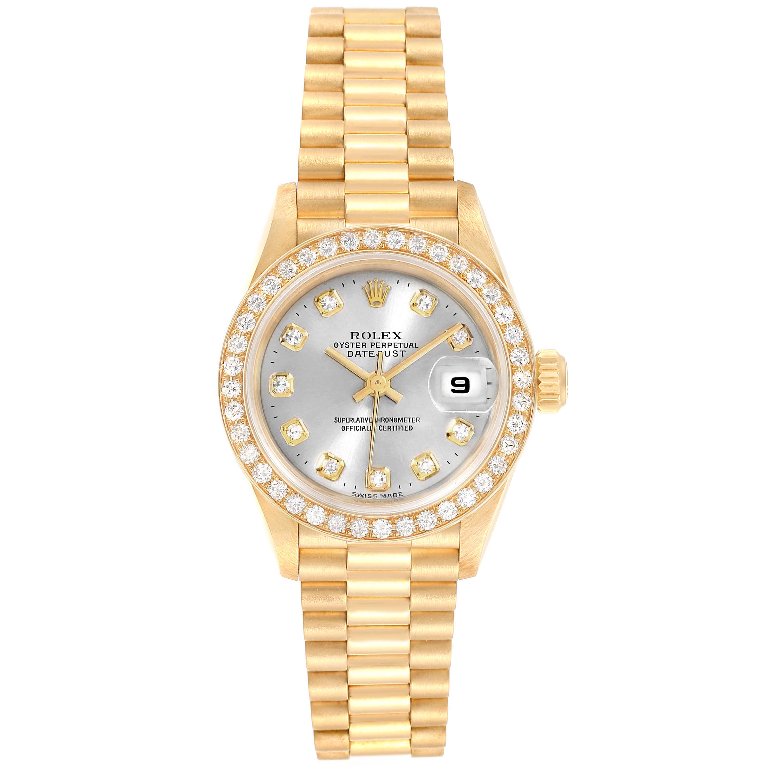 This image shows a Rolex President 69138 Women's Yellow Gold Silver Dial 69138 Women's Yellow Gold Silver Dial model watch from a frontal angle, featuring its gold bracelet, diamond bezel, and date display.