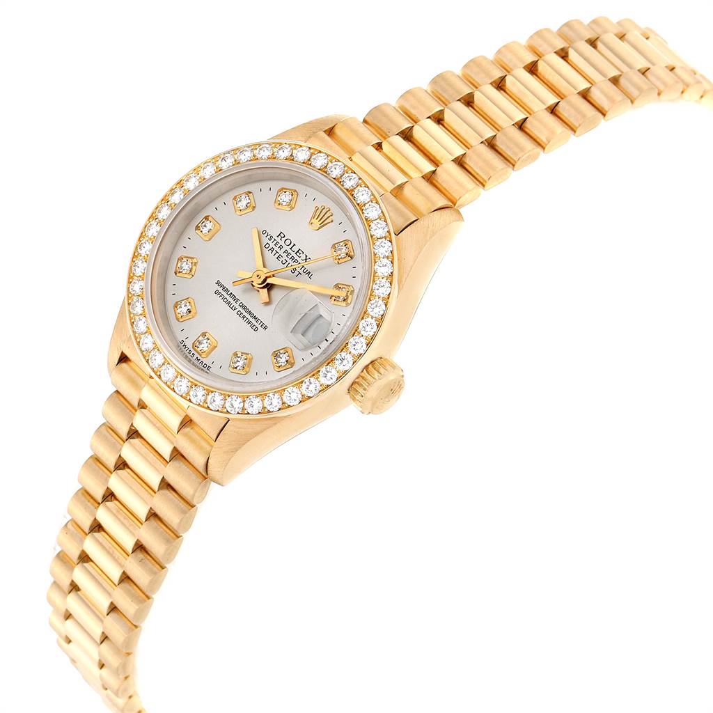 This Rolex President 69138 Women's Yellow Gold Silver Dial 69138 Women's Yellow Gold Silver Dial model watch is shown at an angled view, highlighting its face, bezel, crown, and bracelet.