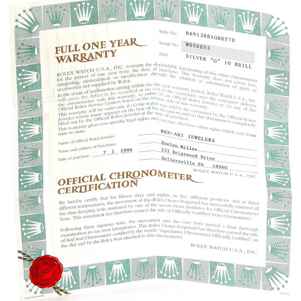 This image shows the warranty and certification documents for a Rolex President 69138 Women's Yellow Gold Silver Dial 69138 Women's Yellow Gold Silver Dial model watch.