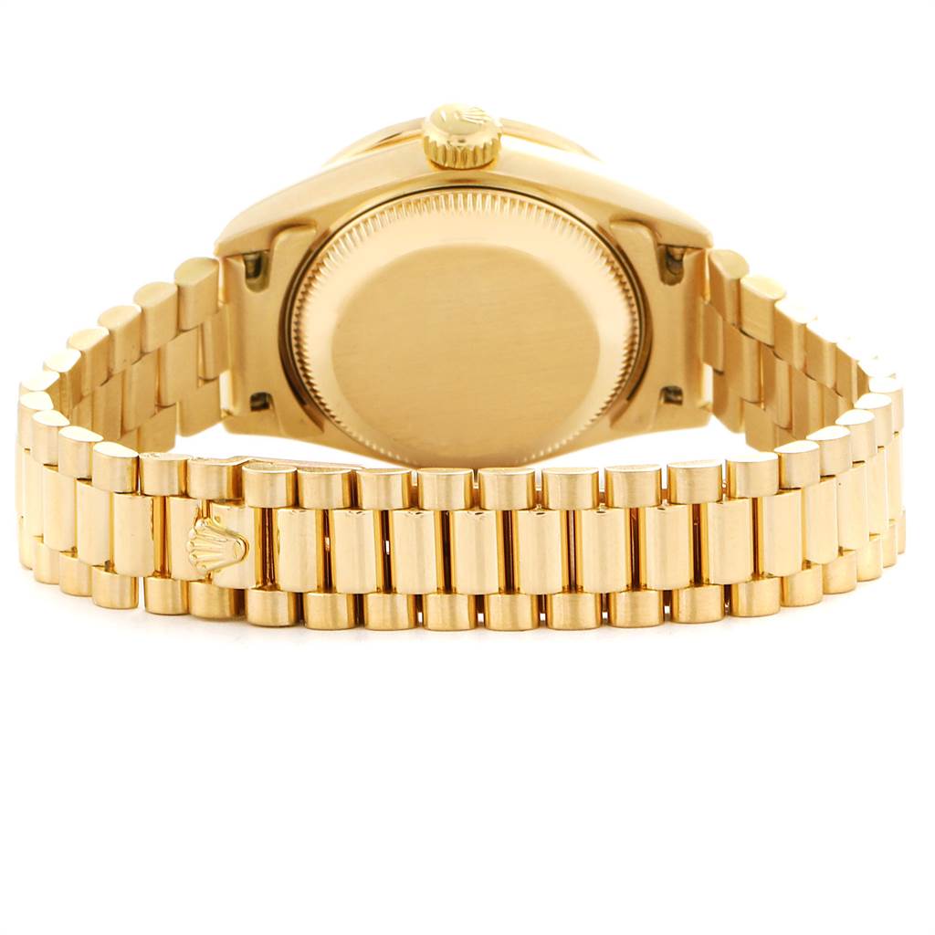 This image shows the back view of a Rolex President 69138 Women's Yellow Gold Silver Dial 69138 Women's Yellow Gold Silver Dial watch, featuring its gold case and bracelet.