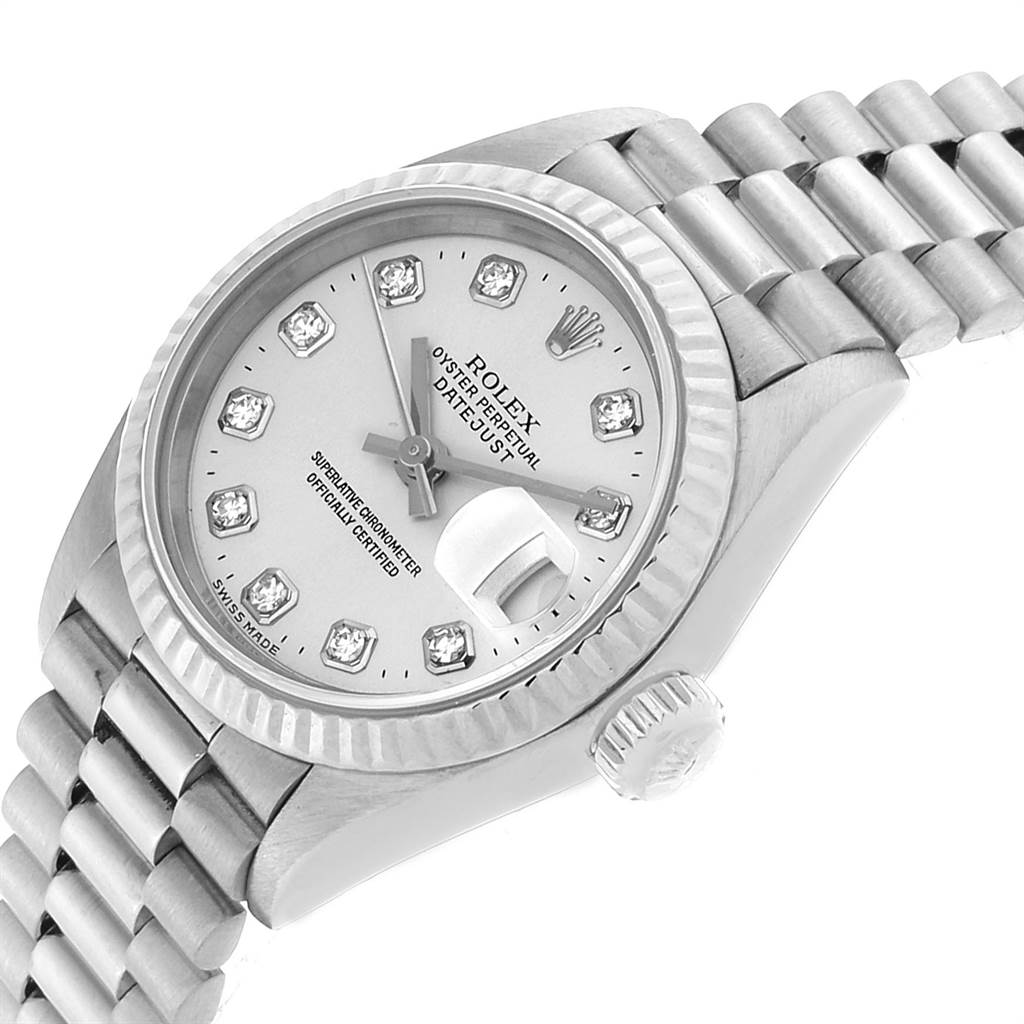 This image shows a close-up view of the Rolex President 69179 Women's White Gold Silver Dial 69179 Women's White Gold Silver Dial model, featuring its dial, bezel, crown, and part of the metal bracelet.