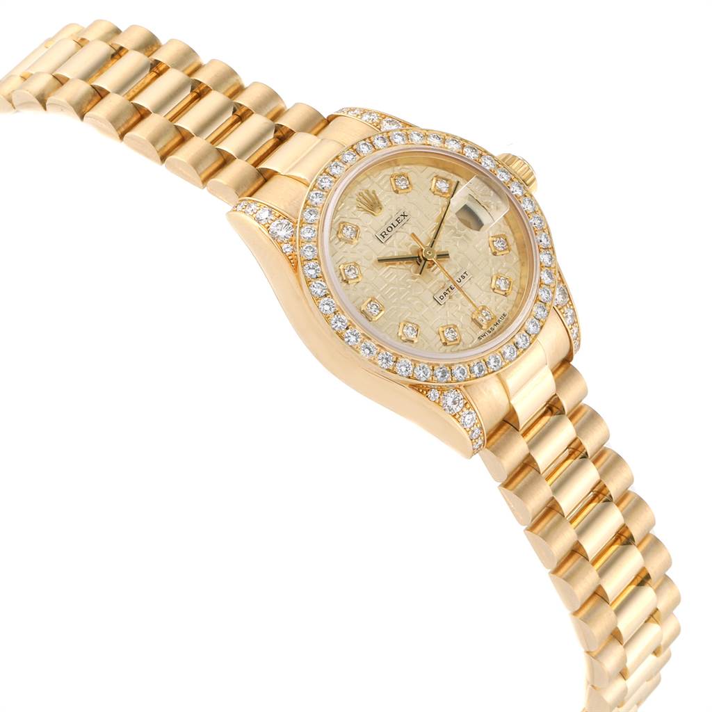 The image shows a Rolex President 179298 Women
s Yellow Gold Champagne Dial 179298 Women
s Yellow Gold Champagne Dial model watch at an oblique angle, highlighting its diamond-encrusted bezel and bracelet.