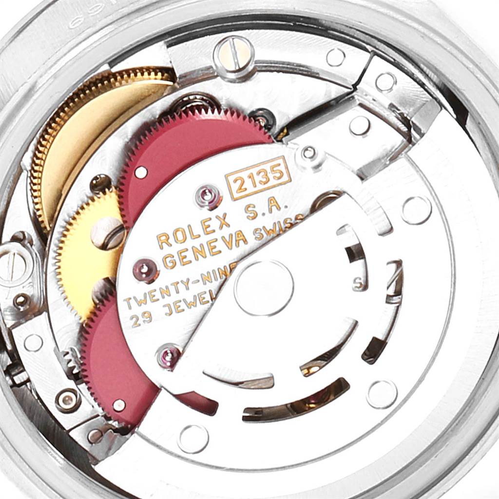 This image shows the intricate internal mechanism of a Rolex President 69179 Women's White Gold Silver Dial 69179 Women's White Gold Silver Dial model watch, specifically the movement and gear components.
