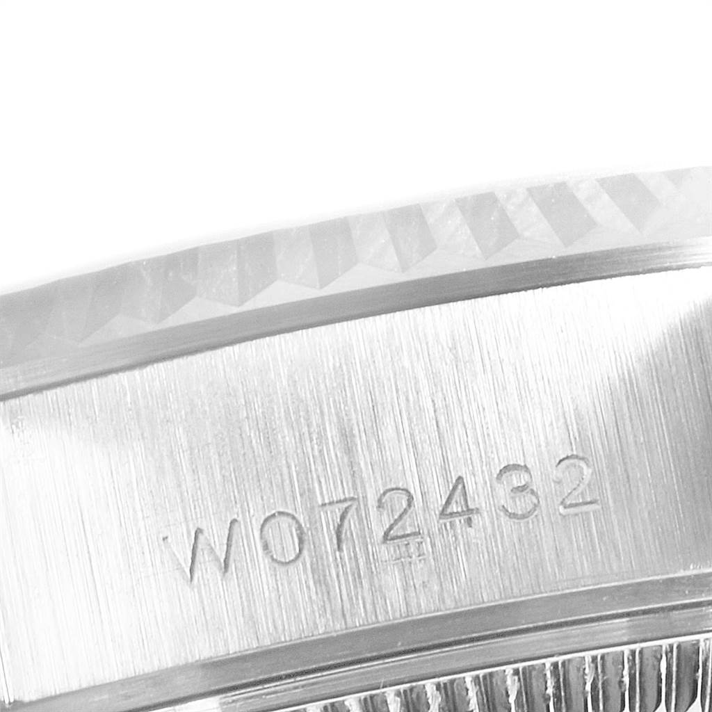 This image shows a close-up of the serial number engraving on the case of a Rolex President 69179 Women's White Gold Silver Dial 69179 Women's White Gold Silver Dial model watch.