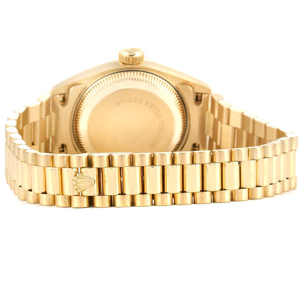 The image shows the backside and bracelet of a Rolex President 69178 Women
s Yellow Gold Champagne Dial 69178 Women
s Yellow Gold Champagne Dial model watch, highlighting the case back and signature bracelet links.
