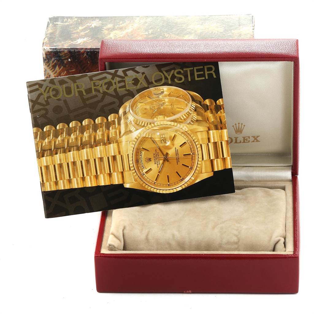 The image shows a Rolex President 69138 Women's Yellow Gold Green Dial 69138 Women's Yellow Gold Green Dial model watch box and an informational booklet, viewed from the front.