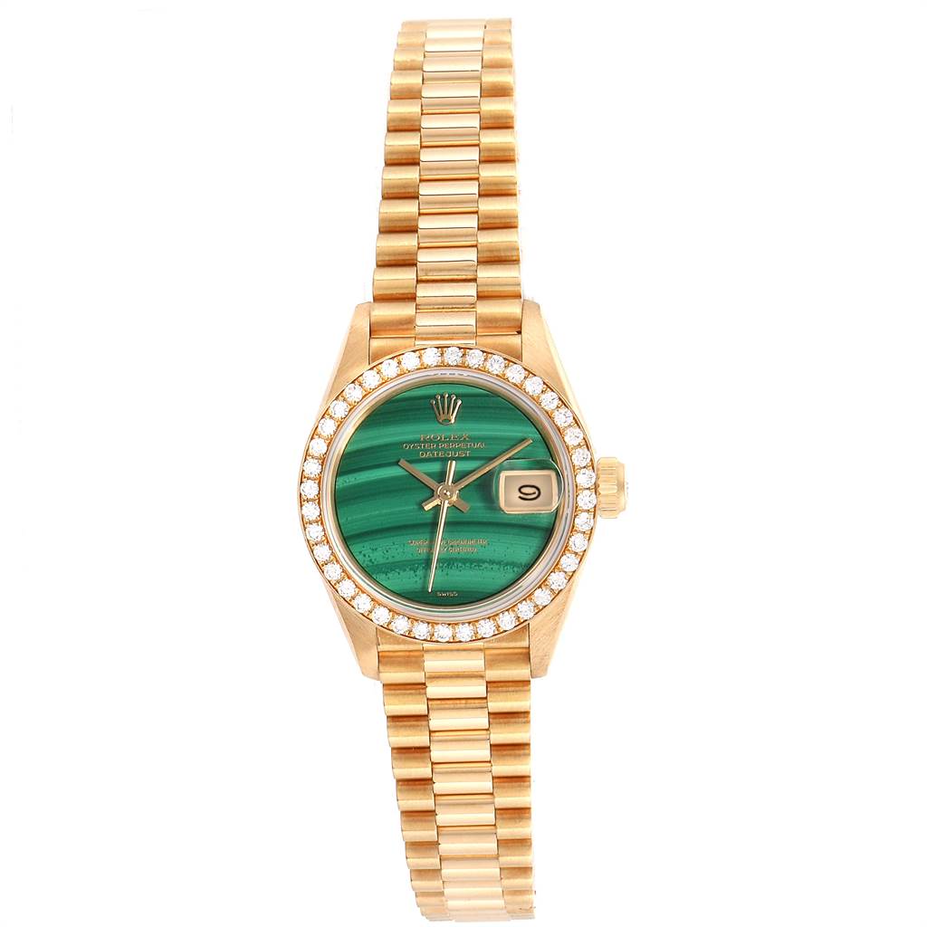 This President model Rolex watch is shown from a top view, displaying the face, bezel, and bracelet.