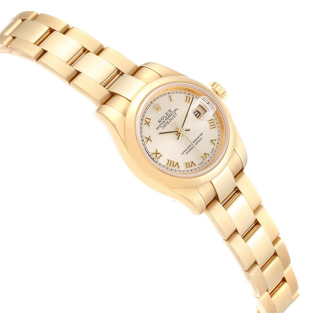The image shows a Rolex President 179168 Women
s Yellow Gold Champagne Dial 179168 Women
s Yellow Gold Champagne Dial watch at a slight angle, highlighting the gold band, face, and date display.