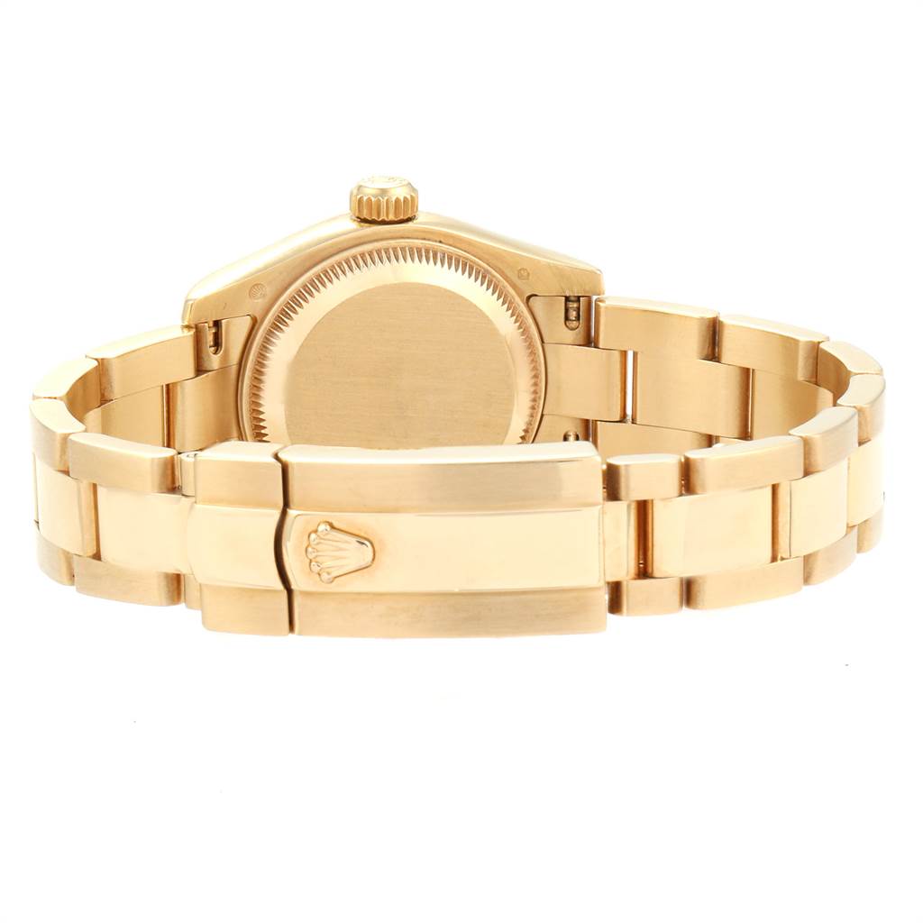 The image shows the back view of the Rolex President 179168 Women
s Yellow Gold Champagne Dial 179168 Women
s Yellow Gold Champagne Dial model watch, highlighting its clasp, bracelet, and case back.