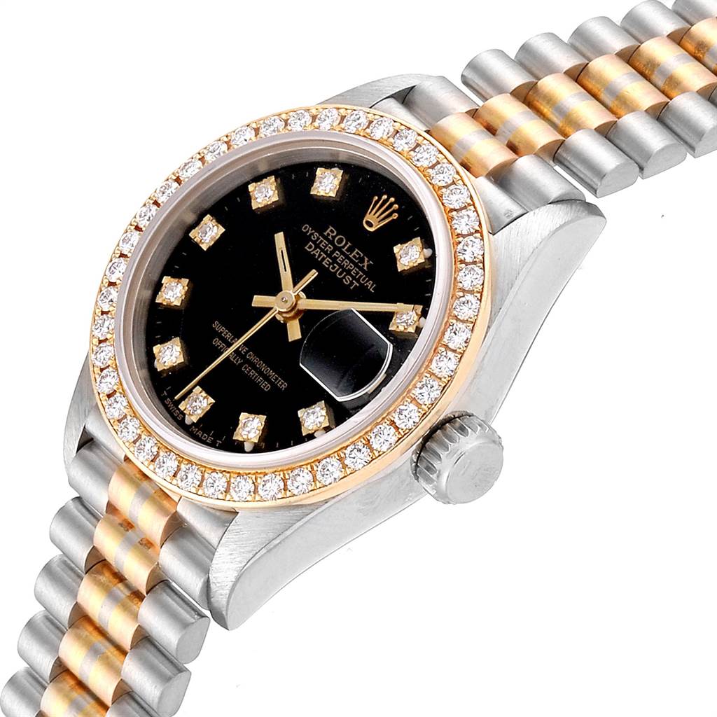 The image shows a Rolex President 69179 Women's White Gold Black Dial 69179 Women's White Gold Black Dial model watch at an angled side view, highlighting its black diamond-accented dial, bezel, and two-tone bracelet.