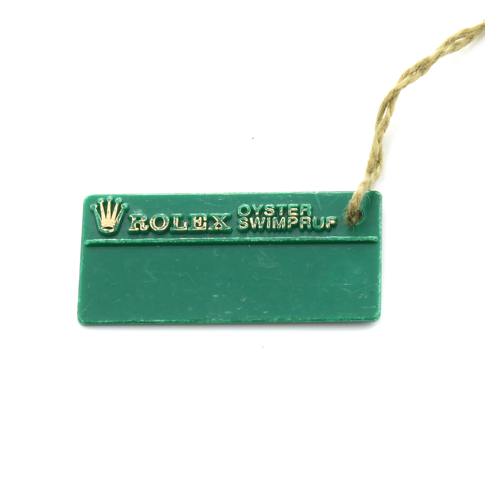 This image shows a green Rolex Oyster Swimpruf tag, an accessory for the Rolex President 69138 Women
s Yellow Gold White Dial 69138 Women
s Yellow Gold White Dial model watch.