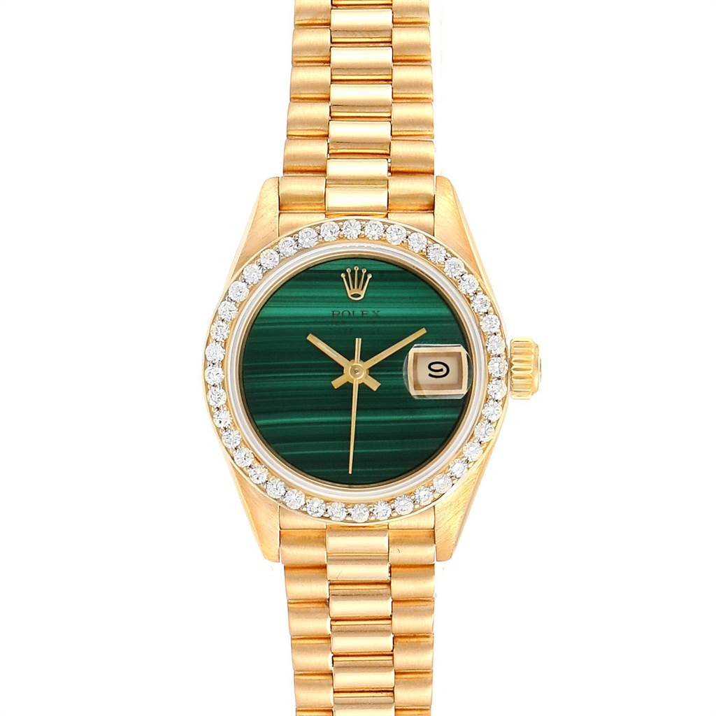 This image shows a frontal view of a Rolex President 69138 Women's Yellow Gold Green Dial 69138 Women's Yellow Gold Green Dial model watch, displaying its green dial, date window, and gold bracelet.