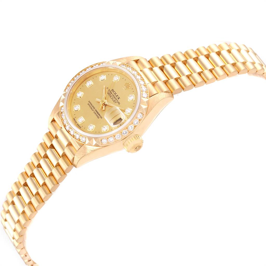 The image shows a side angle of a Rolex President 69268 Women
s Yellow Gold Champagne Dial 69268 Women
s Yellow Gold Champagne Dial model watch, highlighting the face, bezel, crown, and bracelet.