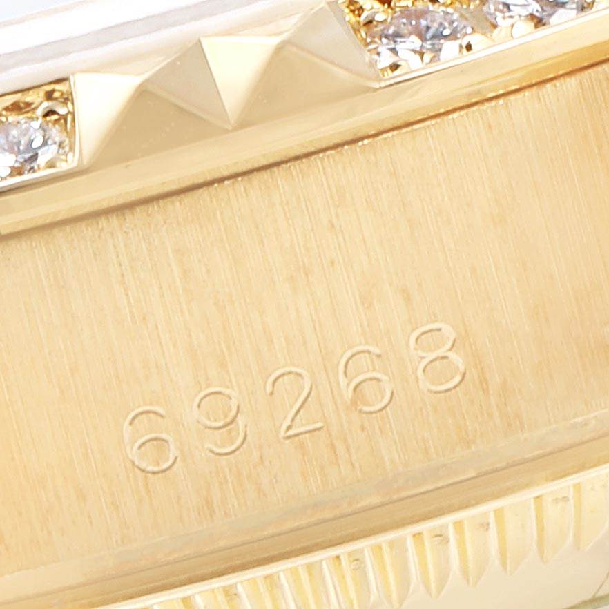 Close-up of the Rolex President 69268 Women
s Yellow Gold Champagne Dial 69268 Women
s Yellow Gold Champagne Dial model watch showing the model number 69268 engraved on the gold case.