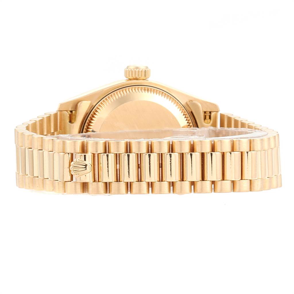 The image shows the back view of a Rolex President 69258 Women
s Yellow Gold Champagne Dial 69258 Women
s Yellow Gold Champagne Dial model watch, focusing on the bracelet and case back.