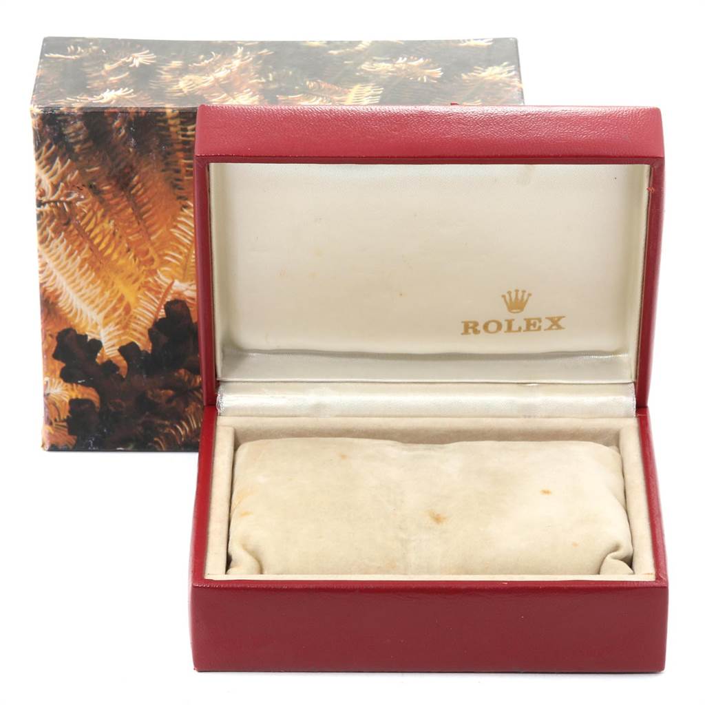 The image shows the open box and pillow accessory for the Rolex President 67198 Women's Yellow Gold Black Dial 67198 Women's Yellow Gold Black Dial model watch.