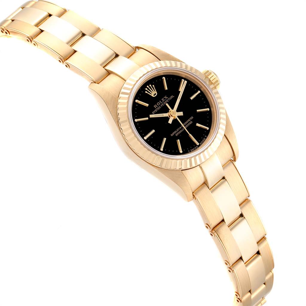 The image shows a Rolex President 67198 Women's Yellow Gold Black Dial 67198 Women's Yellow Gold Black Dial model watch angled from the front-left, displaying the dial, bezel, crown, and bracelet.