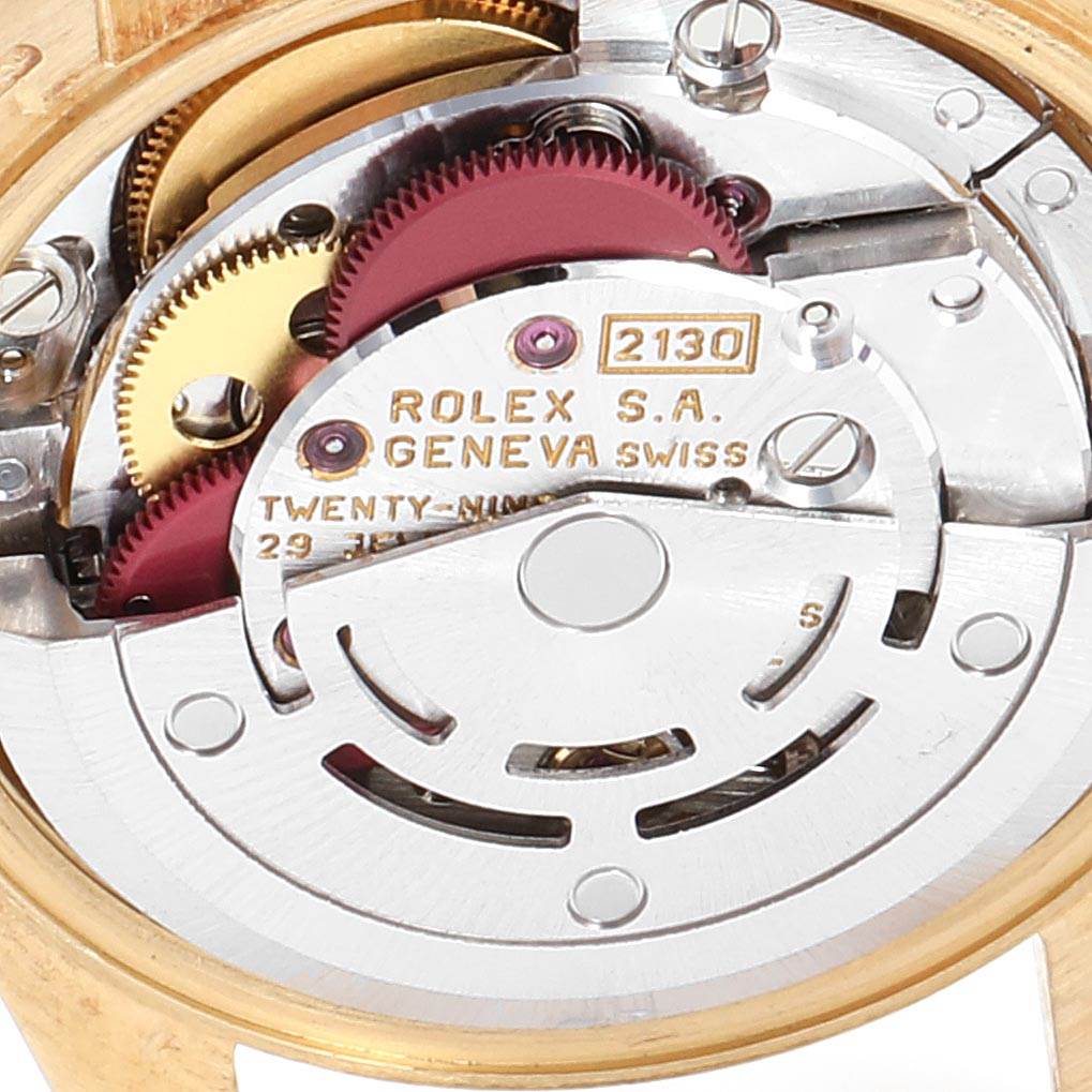 This image shows a detailed view of the Rolex President 67198 Women's Yellow Gold Black Dial 67198 Women's Yellow Gold Black Dial model's internal watch mechanism from the back.