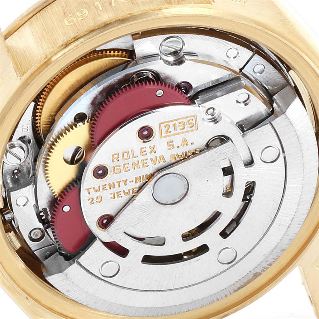 This image shows a close-up view of the inner movement mechanisms of a Rolex President 69178 Women's Yellow Gold White Dial 69178 Women's Yellow Gold White Dial model watch.
