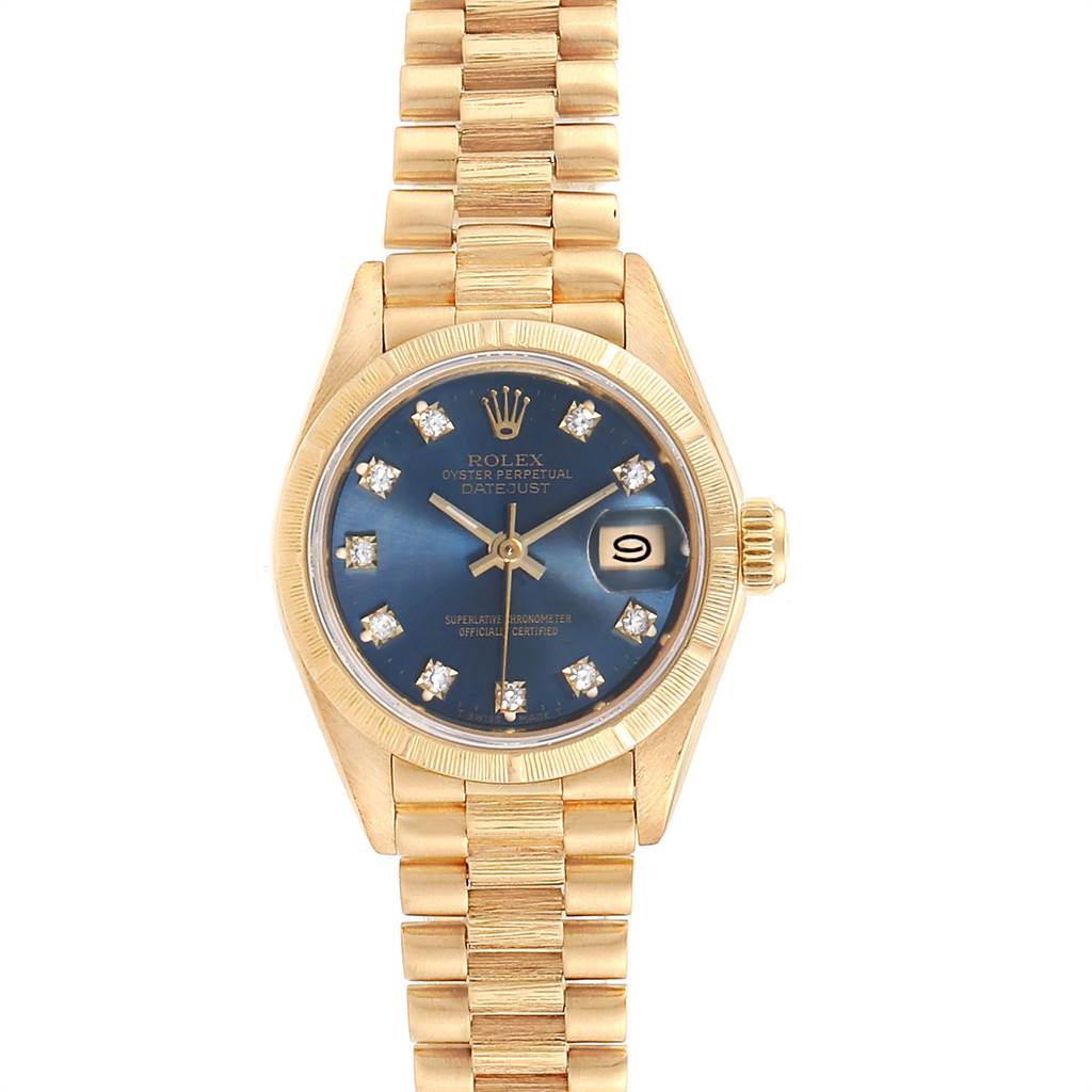 The image shows a Rolex President 69278 Women's Yellow Gold Blue Dial 69278 Women's Yellow Gold Blue Dial model watch from a top-down angle, highlighting its gold bracelet and blue diamond dial.