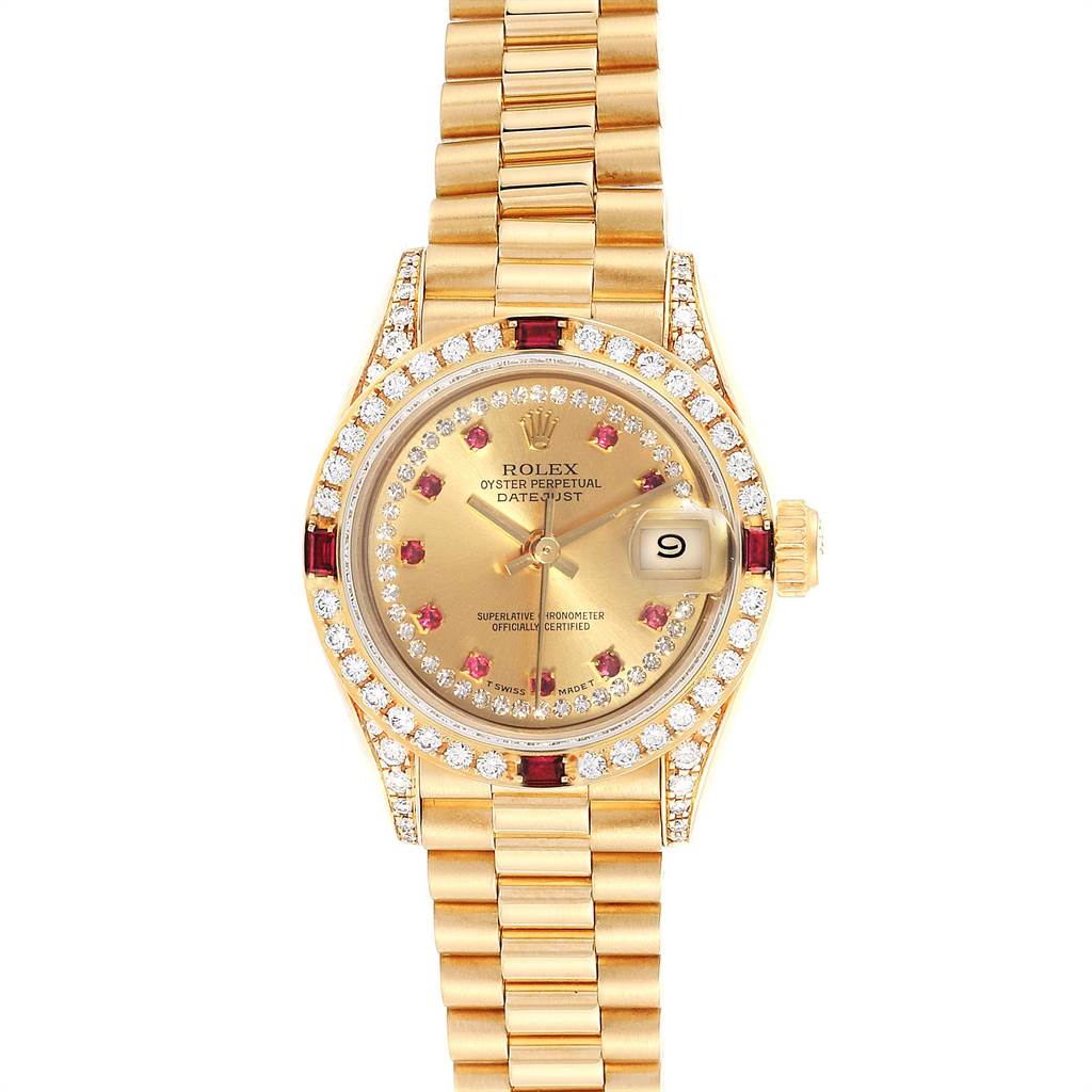 The Rolex President 69238 Women
s Yellow Gold Champagne Dial 69238 Women
s Yellow Gold Champagne Dial model watch is shown from a top-down angle, highlighting its gold bezel, diamond accents, and gold bracelet.