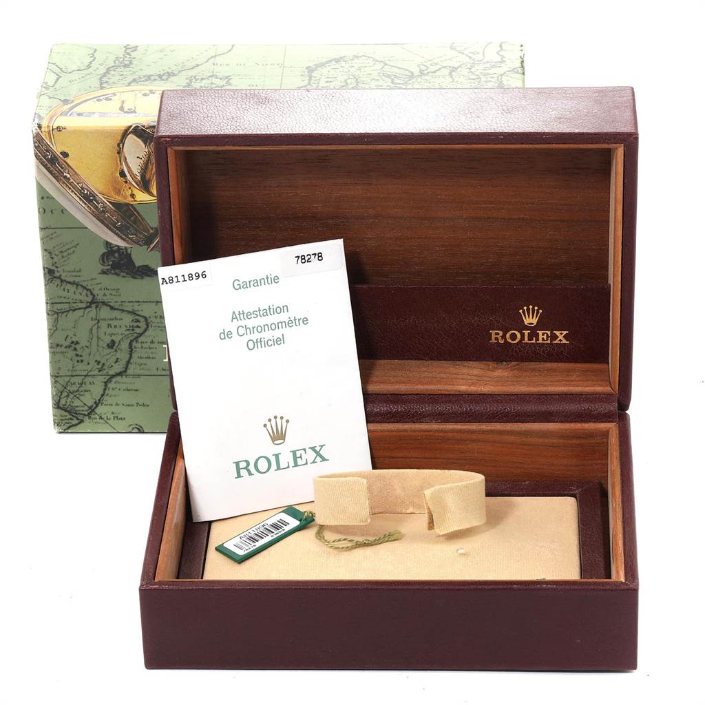 This image shows the open box, warranty card, and accessories for the Rolex President 78278 Women
s Yellow Gold White Dial 78278 Women
s Yellow Gold White Dial model watch.