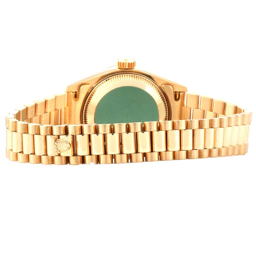 The image shows the back view of a Rolex President 69178 Women's Yellow Gold Champagne Dial 69178 Women's Yellow Gold Champagne Dial model watch, highlighting its gold bracelet and case back.