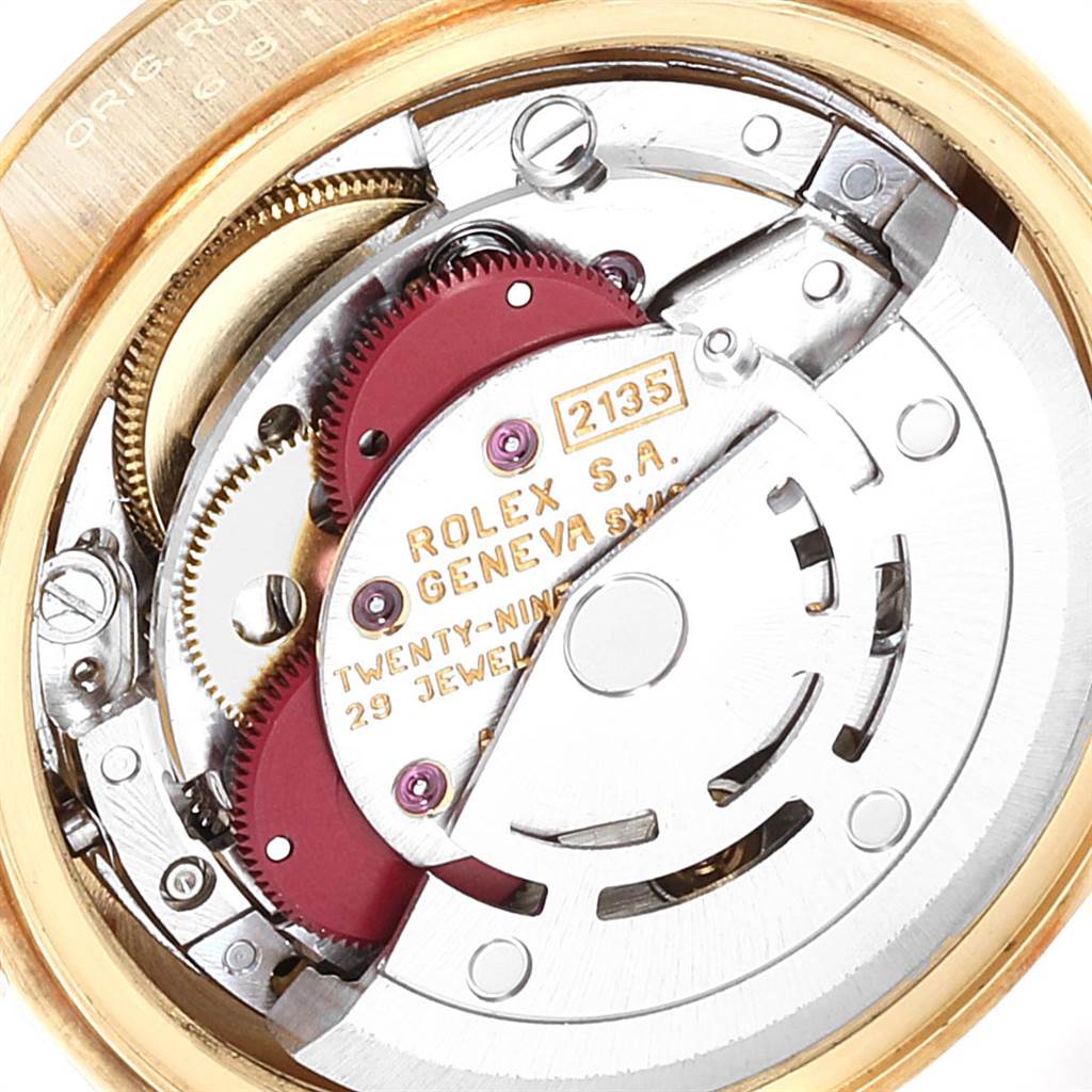 This image shows the movement mechanism of a Rolex President 69178 Women's Yellow Gold Champagne Dial 69178 Women's Yellow Gold Champagne Dial model watch, highlighting its intricate inner components and detailing.