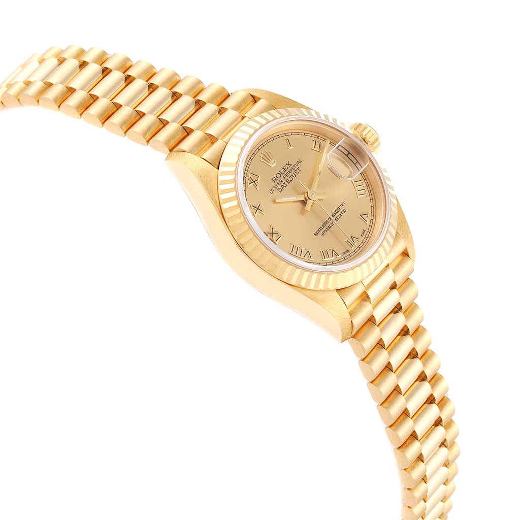 The Rolex President 69178 Women's Yellow Gold Champagne Dial 69178 Women's Yellow Gold Champagne Dial model watch is shown at a slight side angle, highlighting its gold case, fluted bezel, and Presidential bracelet.