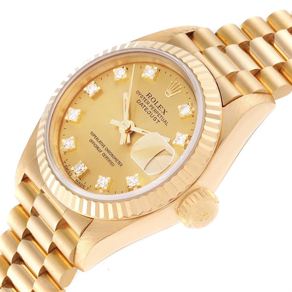 This Rolex President 69178 Women's Yellow Gold Champagne Dial 69178 Women's Yellow Gold Champagne Dial model watch is shown from an angle highlighting the dial, bezel, crown, and part of the bracelet.