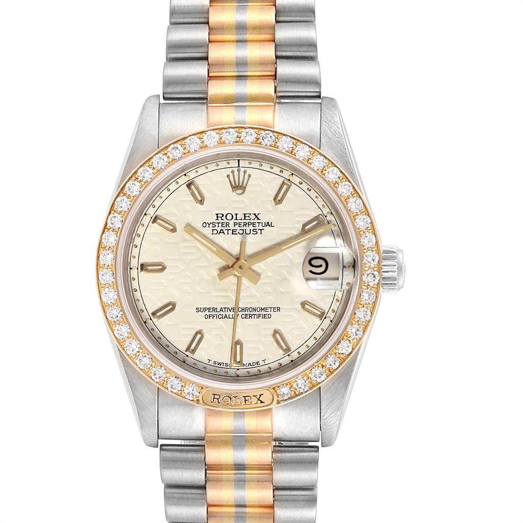 The image displays a front view of a Rolex Datejust President model watch, showcasing the dial, bezel, and bracelet.