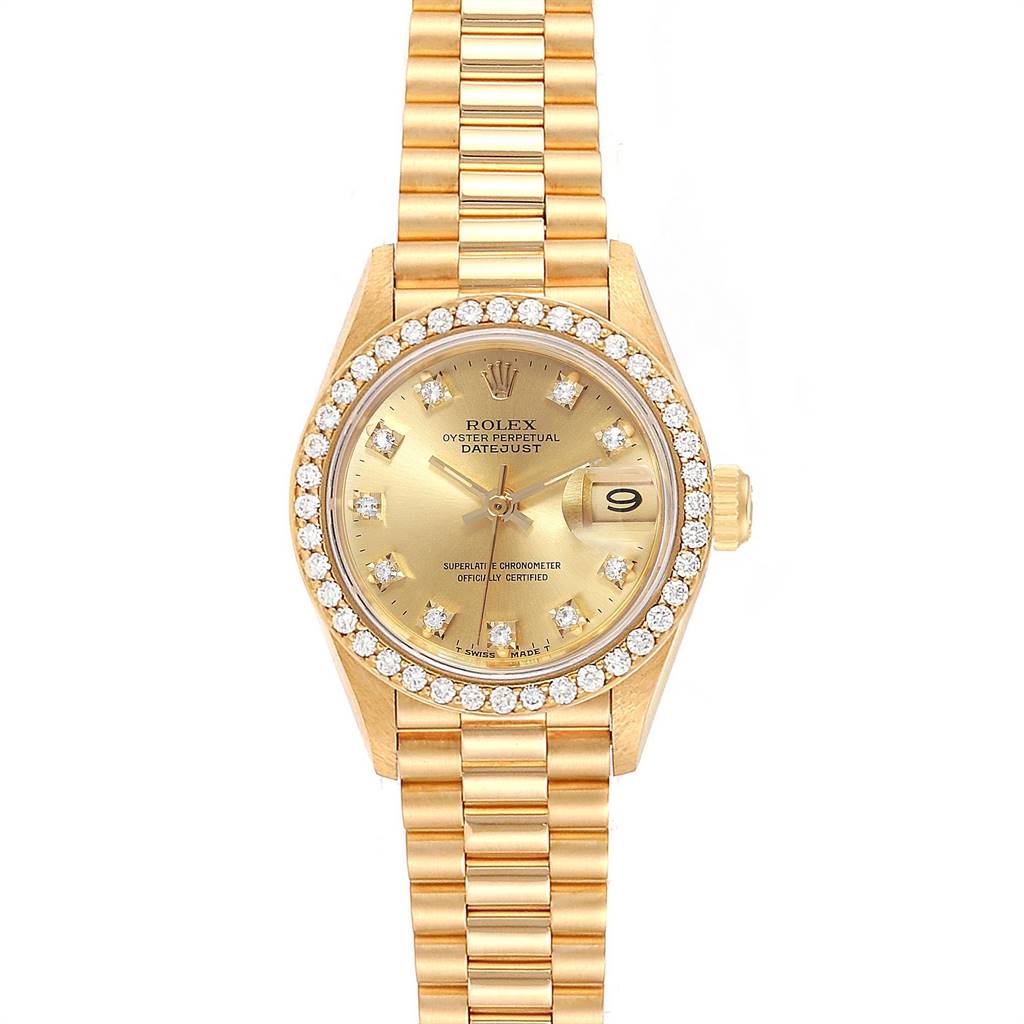 The image shows a Rolex President 69138 Women
s Yellow Gold Champagne Dial 69138 Women
s Yellow Gold Champagne Dial Datejust watch from a top-down angle, highlighting its face, bezel, and band.
