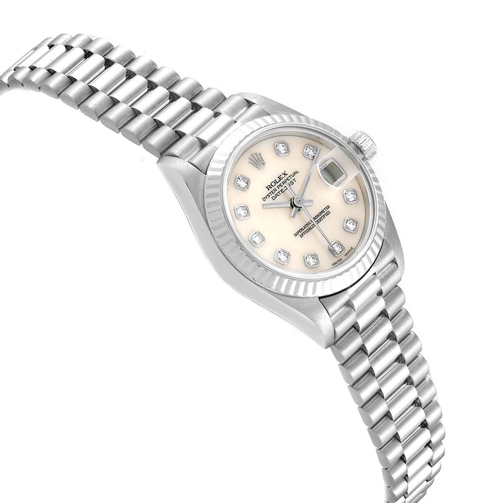 This image shows the Rolex President 69179 Women's White Gold Silver Dial 69179 Women's White Gold Silver Dial model watch angled to display its dial, fluted bezel, and bracelet.