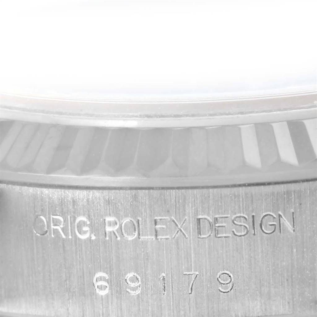 This close-up image shows the engraved case back with the model number of a Rolex President 69179 Women's White Gold Silver Dial 69179 Women's White Gold Silver Dial watch.