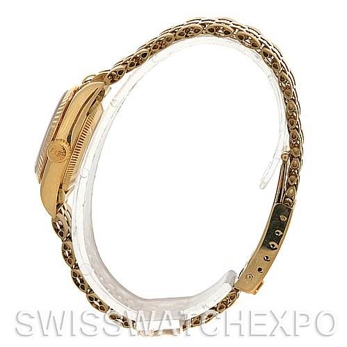 The image shows a side view of the Rolex President 67197 Women's Yellow Gold Silver Dial 67197 Women's Yellow Gold Silver Dial model watch, highlighting its gold case, crown, and bracelet.