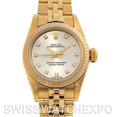 The image shows a front view of a gold Rolex President 67197 Women's Yellow Gold Silver Dial 67197 Women's Yellow Gold Silver Dial model watch, highlighting the dial, bezel, and bracelet.