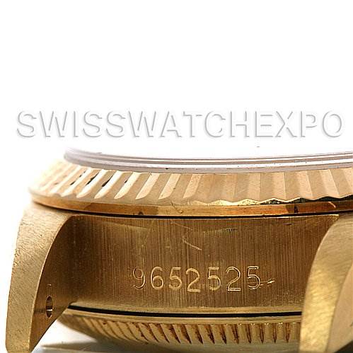 This image shows a close-up side view of the case, bezel, and serial number of a Rolex President 67197 Women's Yellow Gold Silver Dial 67197 Women's Yellow Gold Silver Dial model watch.