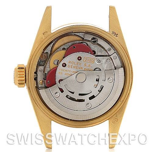 The image shows the back view of the Rolex President 67197 Women's Yellow Gold Silver Dial 67197 Women's Yellow Gold Silver Dial watch case with its internal mechanism exposed.