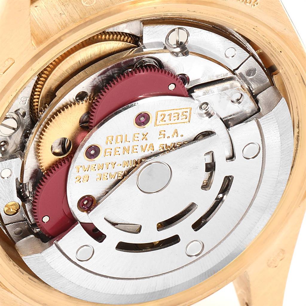 This is a close-up view of the movement mechanism of a Rolex President 69038 Women
s Yellow Gold Champagne Dial 69038 Women
s Yellow Gold Champagne Dial model watch.
