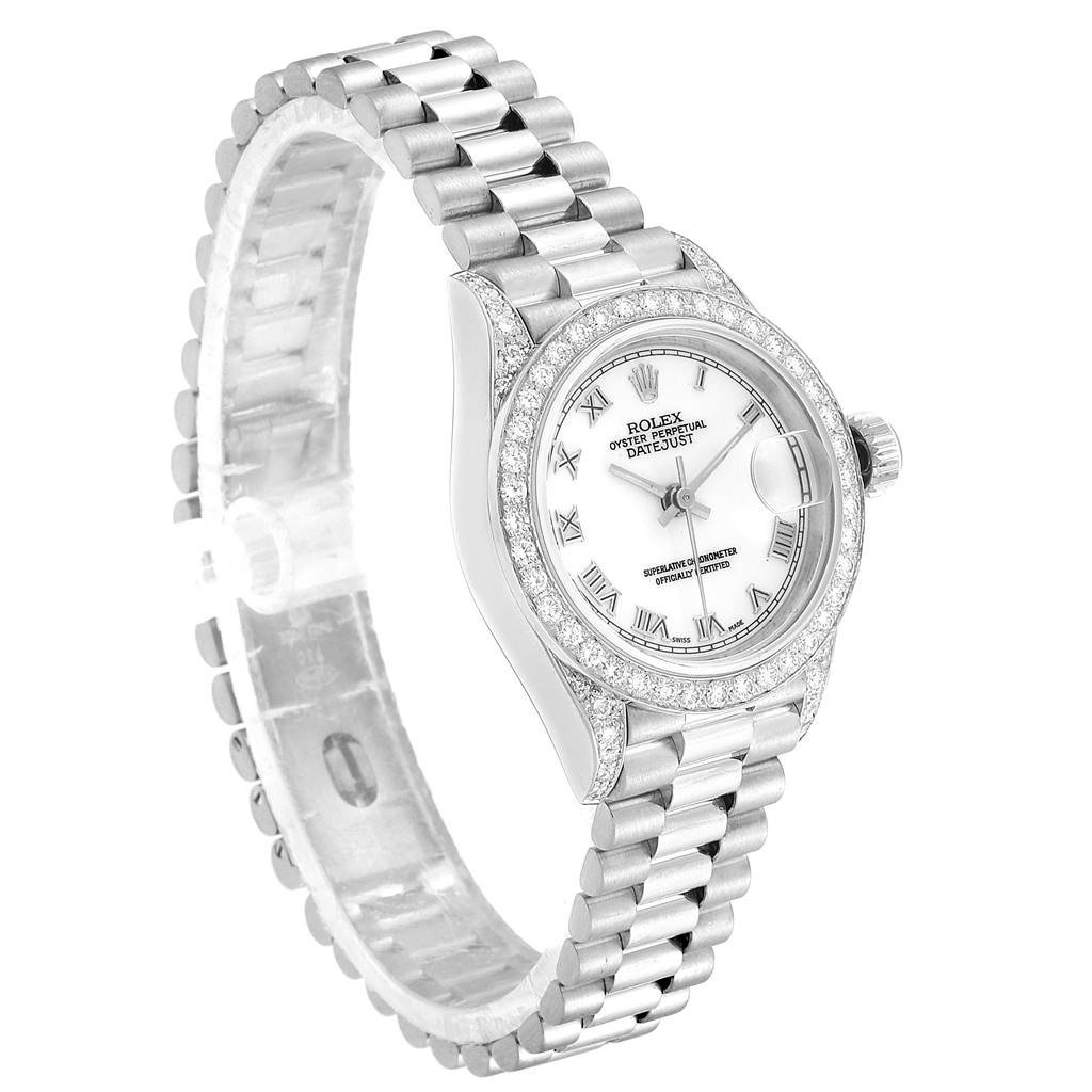 The image shows a Rolex President 69159 Women's White Gold White Dial 69159 Women's White Gold White Dial model watch at a side angle, highlighting its bezel, dial, and bracelet.