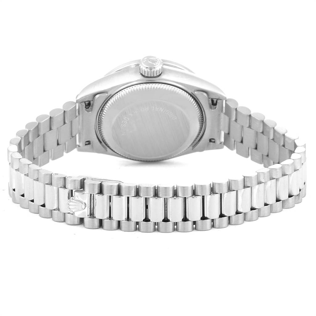The image shows the back view of a Rolex President 69159 Women's White Gold White Dial 69159 Women's White Gold White Dial model watch, highlighting its case back and metal bracelet.