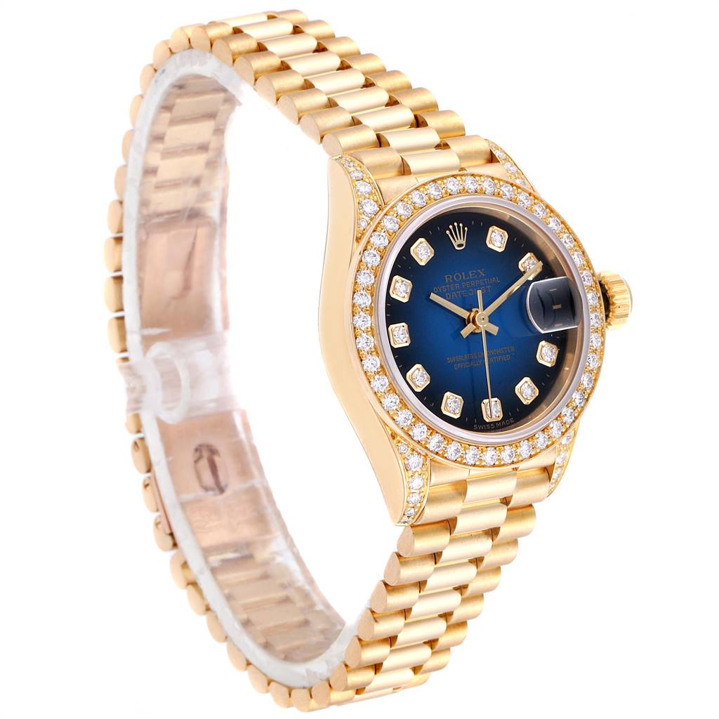 The side view of the Rolex President 69158 Women's Yellow Gold Blue Dial 69158 Women's Yellow Gold Blue Dial watch showcases its bracelet, gold case, blue dial, and diamond bezel.