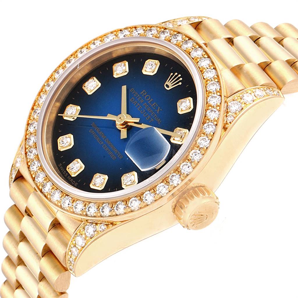 This image shows a close-up angle of a Rolex President 69158 Women's Yellow Gold Blue Dial 69158 Women's Yellow Gold Blue Dial model watch, highlighting the dial, bezel, and parts of the bracelet.