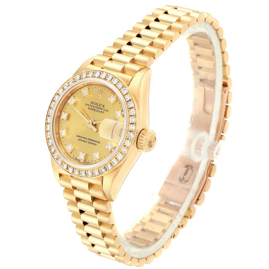 The Rolex President 69178 Women's Yellow Gold Champagne Dial 69178 Women's Yellow Gold Champagne Dial model watch is shown at a three-quarter angle, displaying its gold bracelet, diamond bezel, and dial.