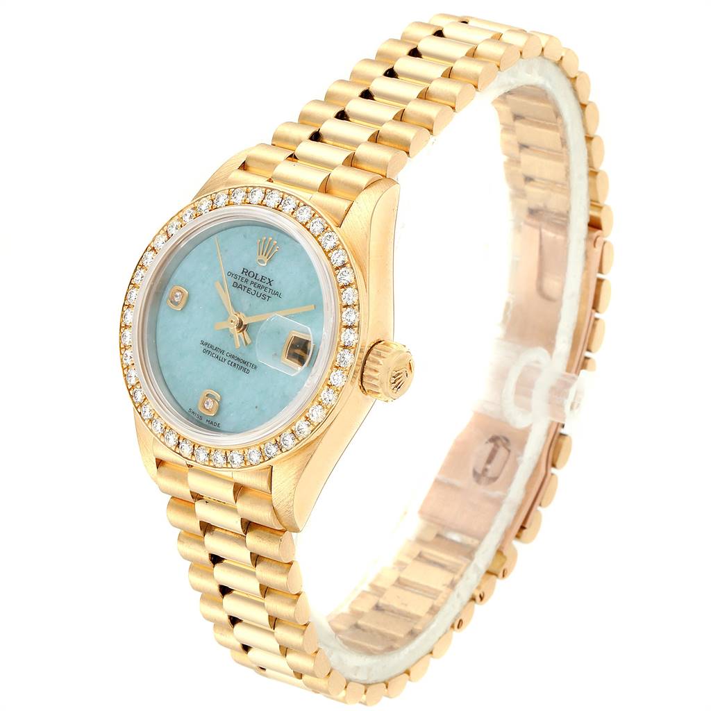 The Rolex President 69178 Women's Yellow Gold Blue Dial 69178 Women's Yellow Gold Blue Dial model watch is shown at an angled view, highlighting the face, bezel, crown, and bracelet.