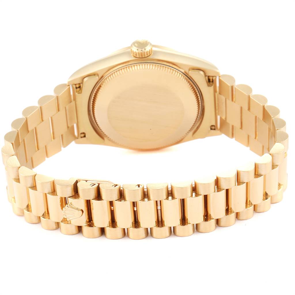 The image shows the back view of a Rolex President 68278 Women's Yellow Gold White Dial 68278 Women's Yellow Gold White Dial model watch, highlighting the case back and bracelet.