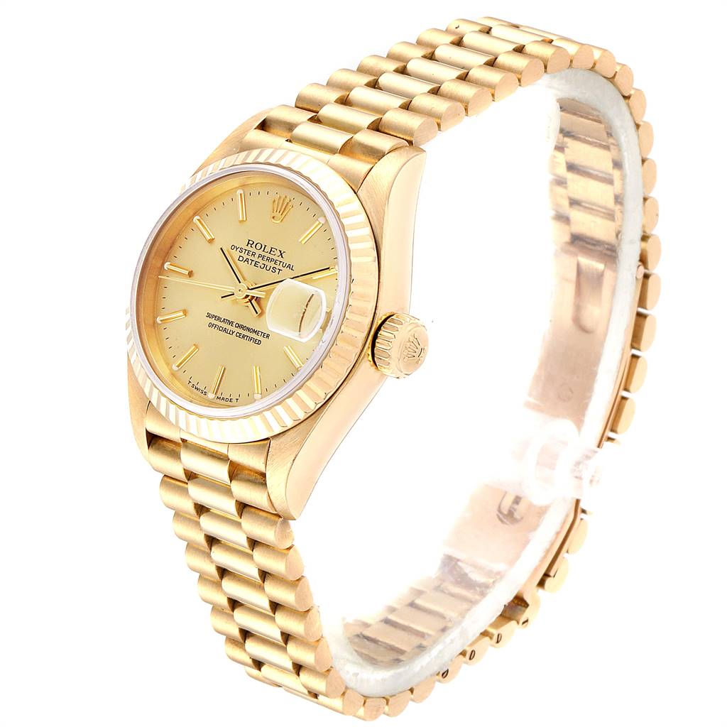 This image shows a Rolex President 79178 Women's Yellow Gold Champagne Dial 79178 Women's Yellow Gold Champagne Dial model watch at a tilted side view, highlighting its gold band, face, and crown.